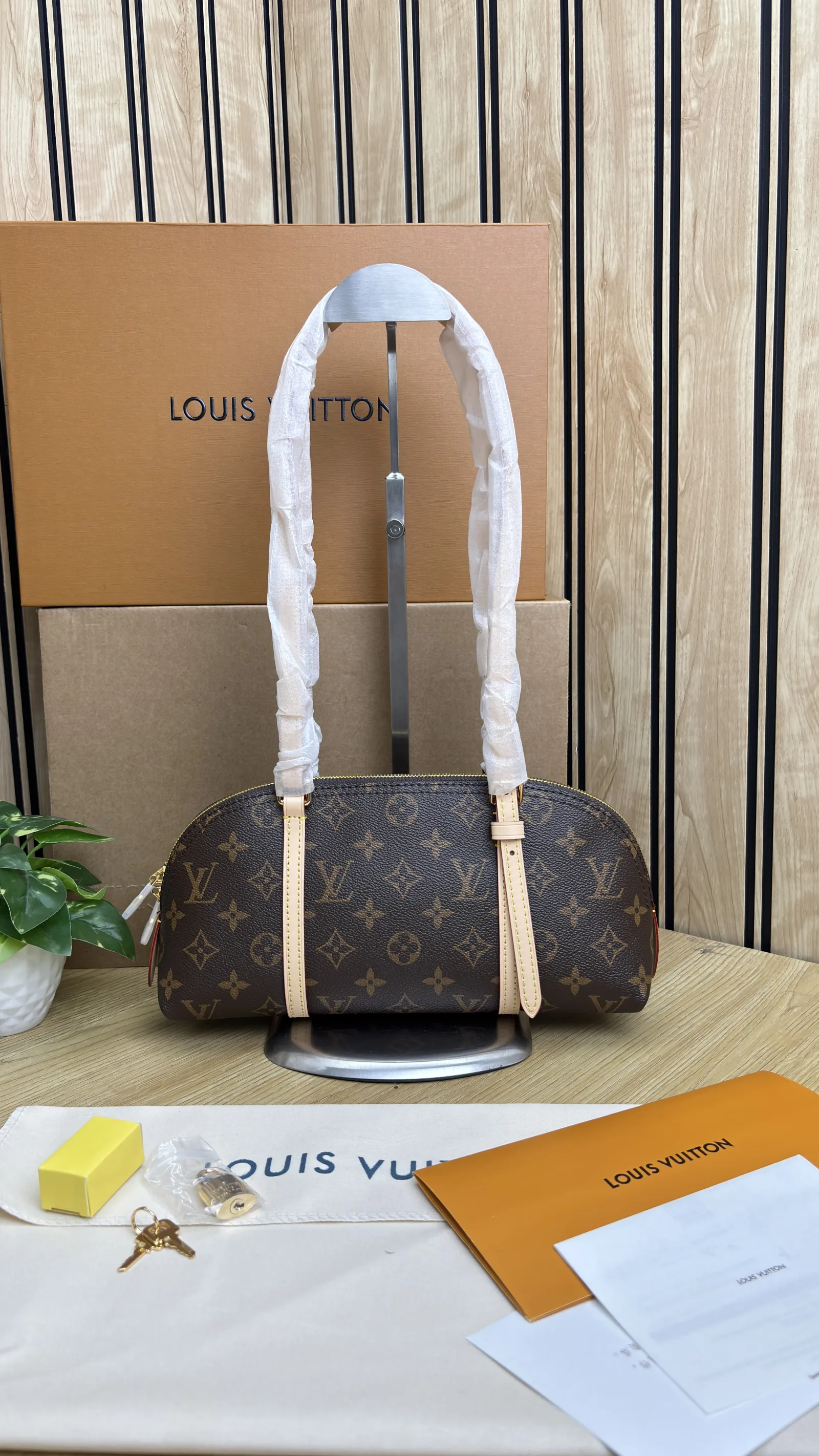 LV SQUIRE EAST WEST BAG